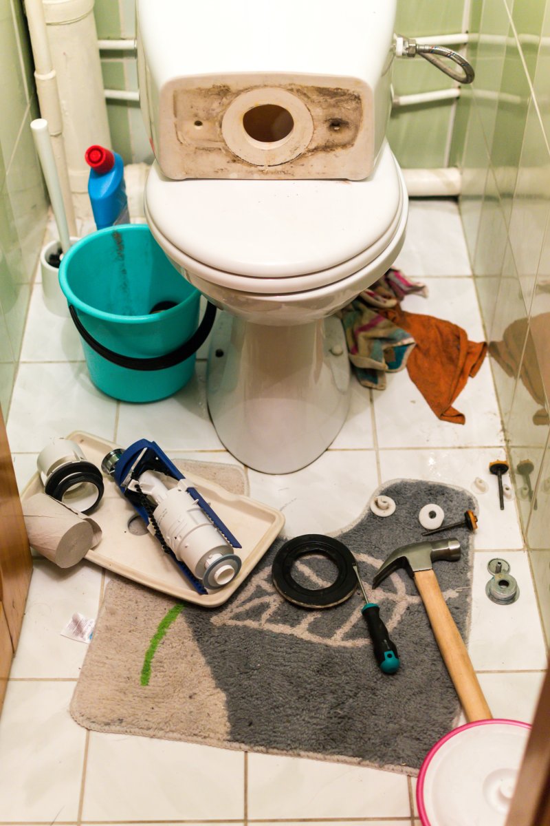New toilet being installed in a Thames Ditton bathroom